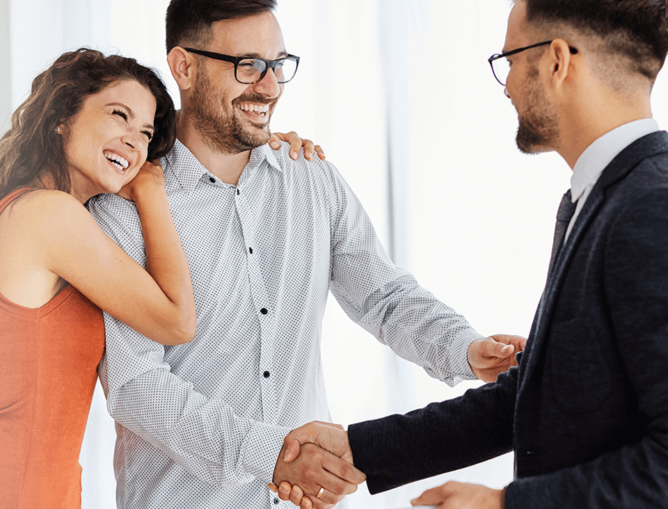 a man and woman shaking hands